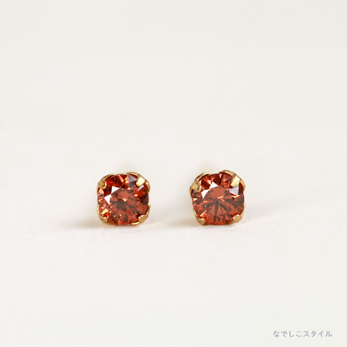 純チタンピアスブランデートパーズピアスの写真