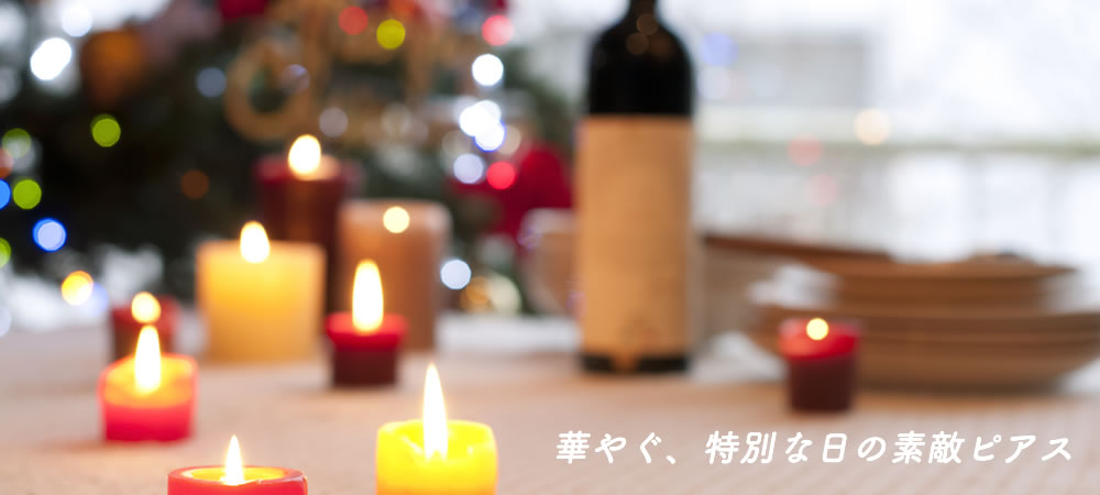 クリスマスをイメージしたキャンドルの画像