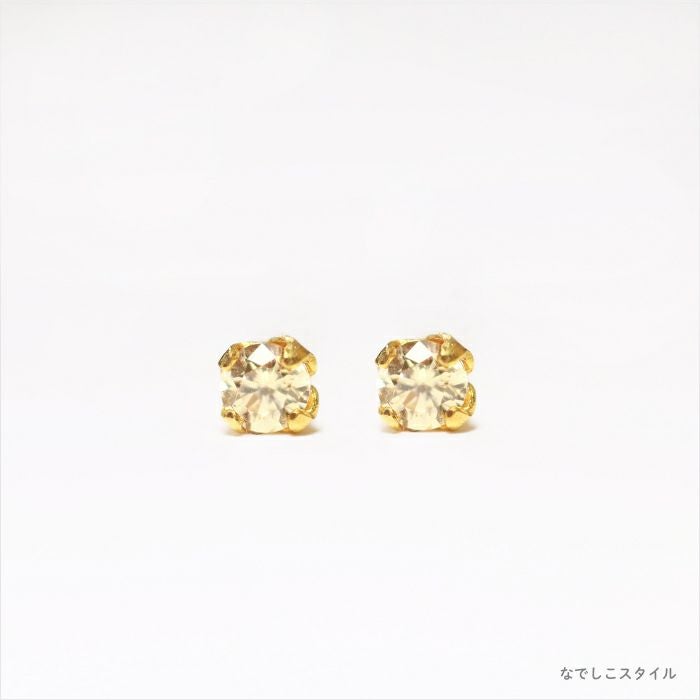 お仕事や学校で使えるチタン純度99.5％のチタンピアス、ゴールド軸の一粒キュービックジルコニアゴールドカラー「シャンパンダイア」２mm、正面からの画像